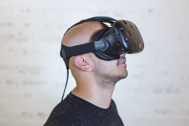 Guy Looking at VR at a Geek Store Collection